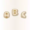 Berloques Jibbitz™ com a letra «a» em bolha dourada Berloques Jibbitz™ com a letra «a» em bolha dourada
