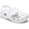Berloques Jibbitz™ com laço rosa brilhante