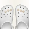 Berloques Jibbitz para sapatos com a letra X dourada Berloques Jibbitz para sapatos com a letra X dourada